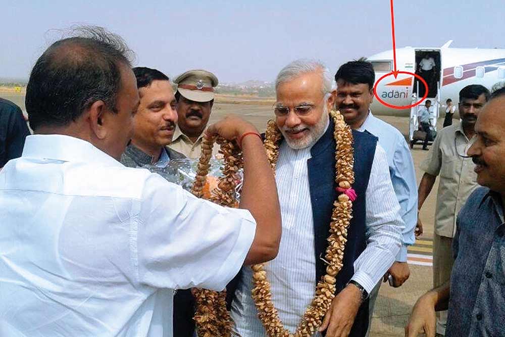 modi_adani_plane_20140310.jpg